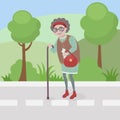 old woman walking on the road along the park Royalty Free Stock Photo