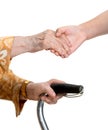 Old woman and young girl holding hands Royalty Free Stock Photo