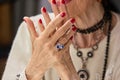 Old womans manicured hands with ring. Royalty Free Stock Photo