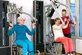 Old Women Exercising at Gym with Instructor Royalty Free Stock Photo