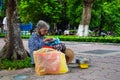 Old women at Hoan Kiem lake, Hanoi, Vietnam. Royalty Free Stock Photo