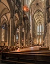 Old women praying in Cologne cathedral in Bonn, Germany