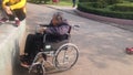 Shenzhen, China: Old women in wheelchairs in parks