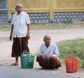 Old women waiting the local bus in Angiang, southern Vietnam