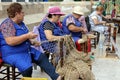 Old women are working and making objects with esparto and hemp grass materials Royalty Free Stock Photo