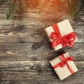 Old wood background with fir branches. Holiday Gifts. Christmas card. Top view. Space for text Royalty Free Stock Photo
