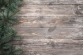 Old wood background with fir branches. Space for a greeting message. Christmas card. Top view Royalty Free Stock Photo