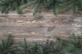 Old wood background with fir branches. Space for a greeting message. Christmas card. Top view Royalty Free Stock Photo