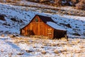 Old wood barn with snow in Telluride, Colorado