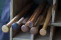 Old wood baseball bats in a bat storage rack at a baseball park Royalty Free Stock Photo