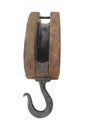 Old wood block and tackle with hook isolated. Royalty Free Stock Photo