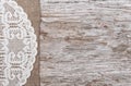 Old wood bordered by burlap and lacy cloth Royalty Free Stock Photo