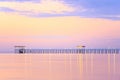 Old wood bridge pier  against beautiful sunset sky use for natural background ,backdrop and multipurpose sea scene Royalty Free Stock Photo