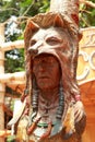 Old wood carved of indian chief head