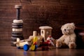 Old wood children toys with teddy bear Royalty Free Stock Photo