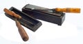 Old wood chisels and oilstone Royalty Free Stock Photo