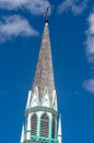 Old wood church steeple set against a blue sky Royalty Free Stock Photo