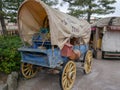 An old Covered wagon and instrument, tool, device, gadget, machine, appliance Royalty Free Stock Photo