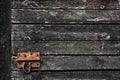 Old wood dark grunge texture for background with rusty door latch Royalty Free Stock Photo