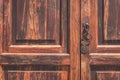 Old wood door closeup with metal knob - Royalty Free Stock Photo