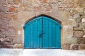 An old wood door decorated with carving Royalty Free Stock Photo