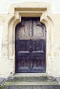 old wood door with metal knob in Prejmer fortified church, Brasov county, Romania Royalty Free Stock Photo