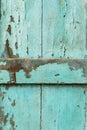 Old Wood door paint green color peeling texture background Royalty Free Stock Photo