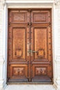 Old wood door on Peles museum, Sinaia Romania