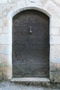 old wood door in saint-cirq-la-popie (france)