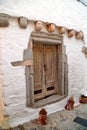 Old wood door in stone wall Royalty Free Stock Photo