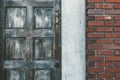 Old wood door vintage brick wall background texture Royalty Free Stock Photo