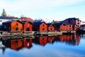 Old wood houses and reflection in water