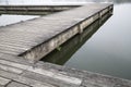 Old grey wood pier by the lake Royalty Free Stock Photo