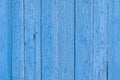 Old wood plank with cracked blue paint background Royalty Free Stock Photo