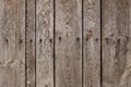 Old wood plank with steel sinker nails texture background. The texture of old wood. Vertical wooden planks.