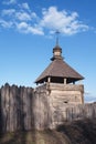 Old wood rustic church building and wooden fence against blue sk Royalty Free Stock Photo