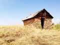 Old wood and stone structure in Montana. Royalty Free Stock Photo