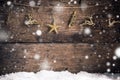 Old wood texture gold star , gold reindeer and decoration with snow flakes christmas background Royalty Free Stock Photo