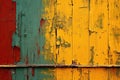 Old wood texture with multicolored, yellow, red, green background, cracked multicolor, vintage wood background with peeling paint Royalty Free Stock Photo