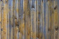 Old wood wall surface, wooden texture, vertical boards Royalty Free Stock Photo