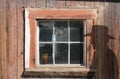 Old wood window and a cowboy silhouette.