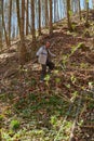 Old woodcutter in the forest