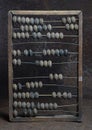 Old wooden abacus, disfigured by time. Royalty Free Stock Photo