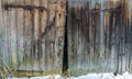 Old wooden abandoned barn door