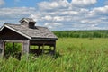 Old wooden abandonned gazebo in a marshland