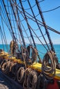 Old wooden Age of sail sailing ship ropes cordage. and shroud Royalty Free Stock Photo