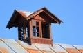 Old wooden attic window on the roof Royalty Free Stock Photo