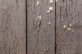 Old wooden background of boards with brown peeling cracked paint. Texture of aged painted wood Royalty Free Stock Photo