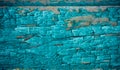 Old wooden background, peeling blue paint. Shabby horizontal board, dilapidated texture, close-up Royalty Free Stock Photo