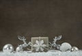 Old wooden background with white and silver grey christmas decor Royalty Free Stock Photo